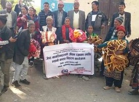 बुढिनन्दा नगरपालिका महिला विकास शाखाद्धारा  न्यानो कपडा वितरण